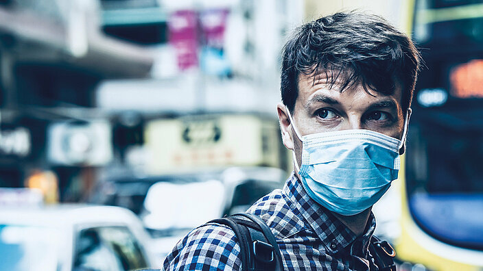 Pedestrian with breathing mask